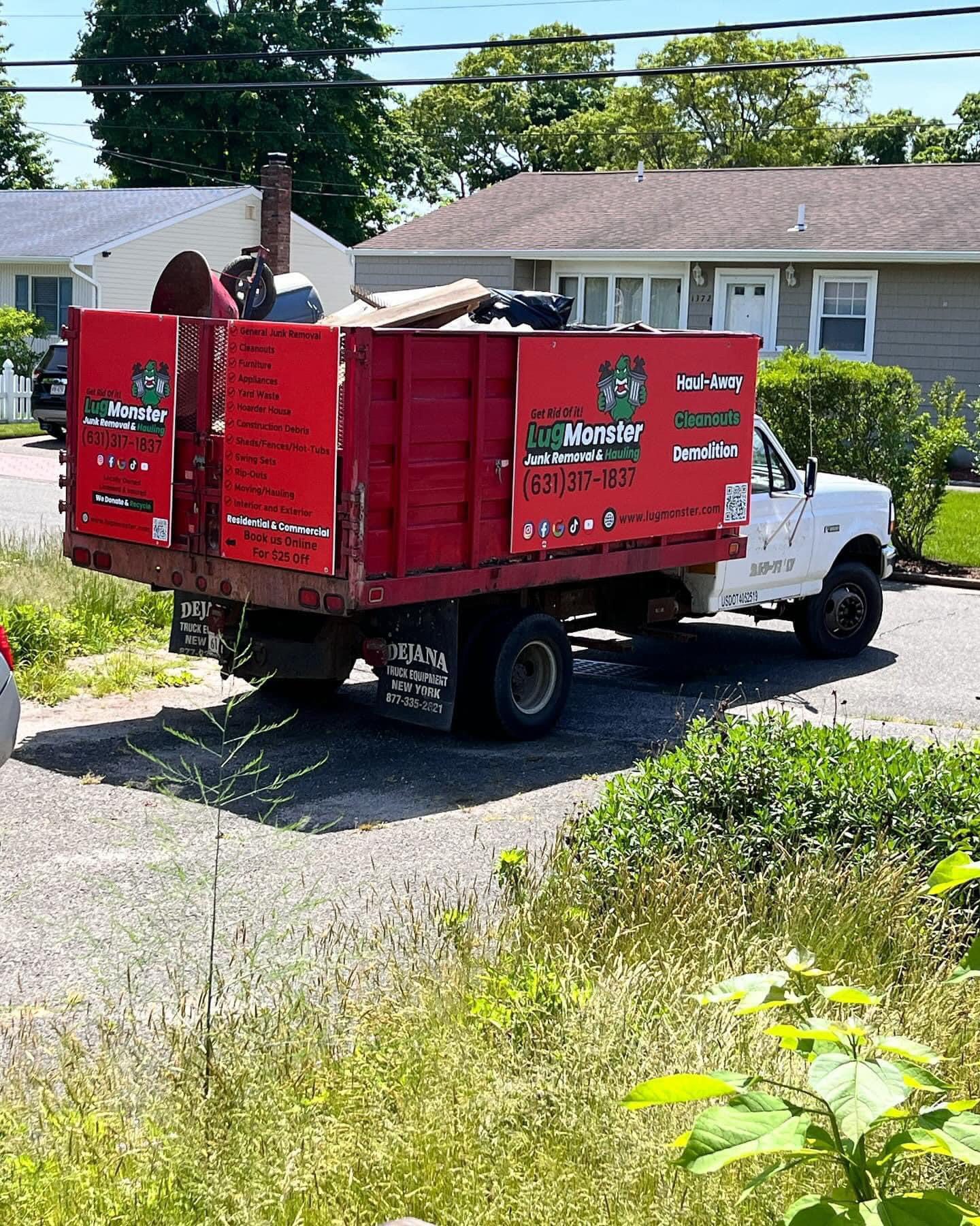 junk removal truck hauling away residential junk in huntington ny
